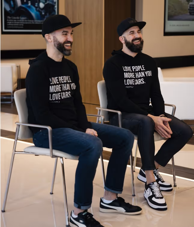 Kyle laughing with co-host in lobby