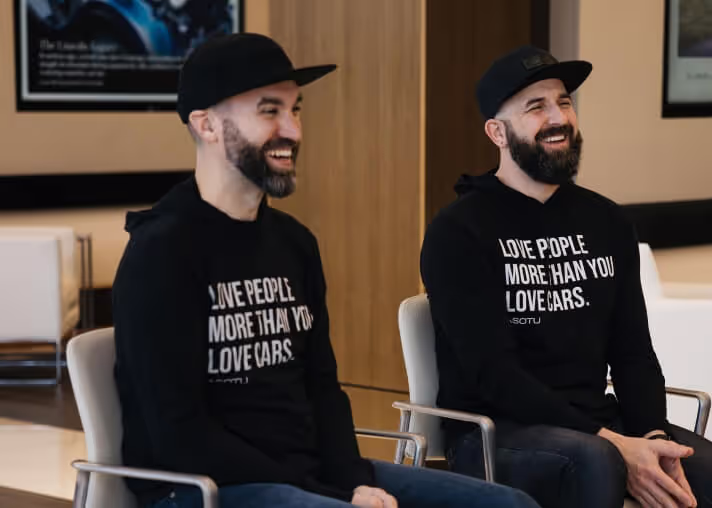 Kyle and co-host in lobby seating
