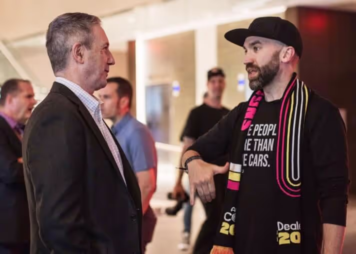 Kyle in conversation at industry event